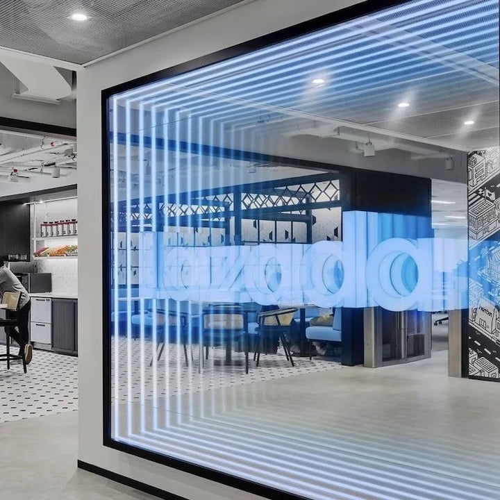 Finished architectural infinity mirror with continuous white illuminated lines.